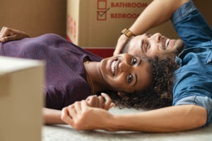 happy couple relaxing during move